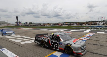HAMPTON, GEORGIA - JUNE 06: Grant Enfinger, driver of the #98 Farm Paint Ford, crosses the finish line to win the NASCAR Gander Outdoors Truck Series Vet Tix Camping World 200 at Atlanta Motor Speedway on June 06, 2020 in Hampton, Georgia. (Photo by Kevin C. Cox/Getty Images) | Getty Images