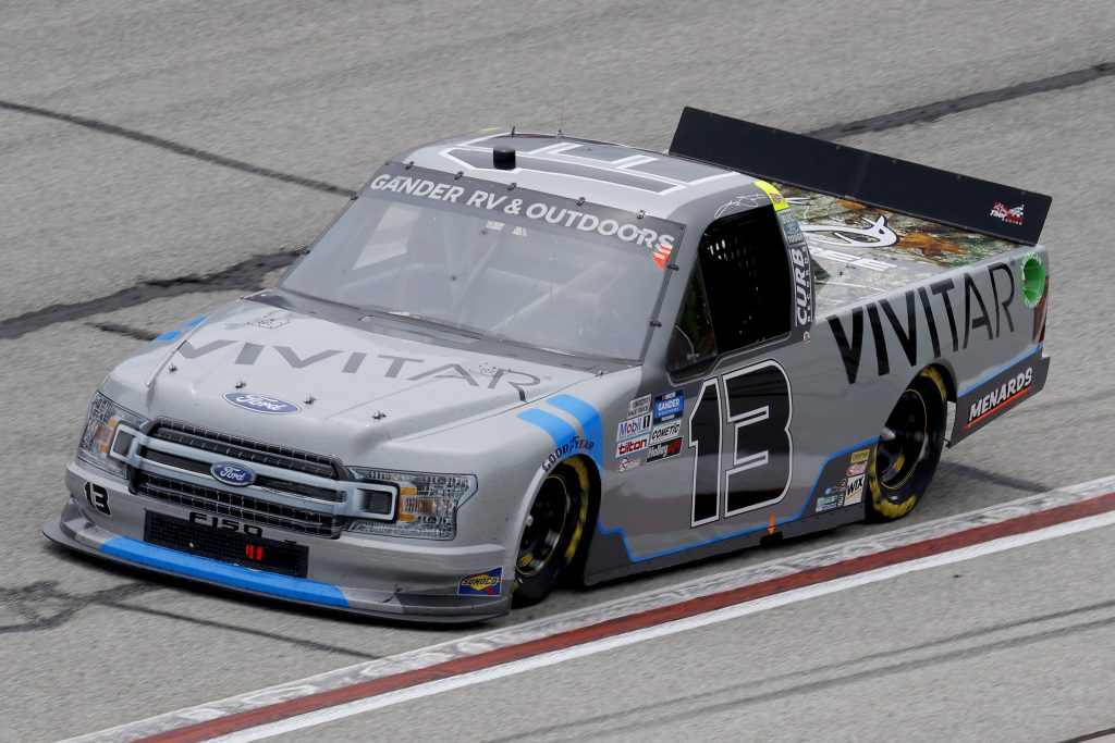 HAMPTON, GEORGIA - JUNE 06: Johnny Sauter, driver of the #13 Vivitar/Altec Lansing Ford, drives during the NASCAR Gander Outdoors Truck Series Vet Tix Camping World 200 at Atlanta Motor Speedway on June 06, 2020 in Hampton, Georgia. (Photo by Chris Graythen/Getty Images) | Getty Images