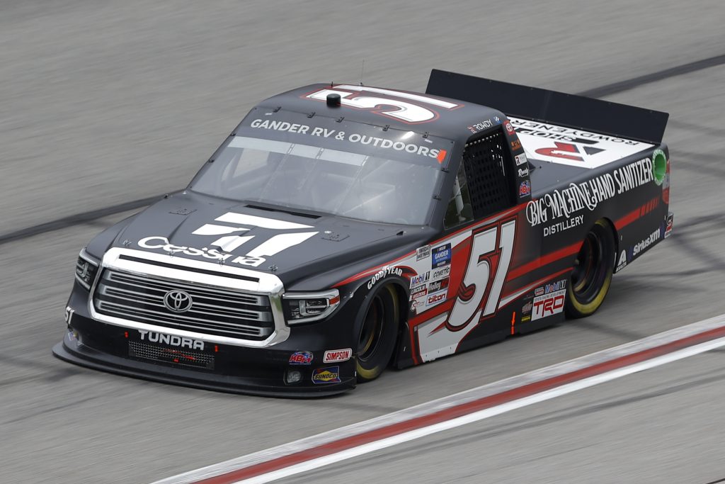 HAMPTON, GEORGIA - JUNE 06: Kyle Busch, driver of the #51 Big Machine Distillery Hand Sanitizer Toyota, drives during the NASCAR Gander Outdoors Truck Series Vet Tix Camping World 200 at Atlanta Motor Speedway on June 06, 2020 in Hampton, Georgia. (Photo by Chris Graythen/Getty Images) | Getty Images