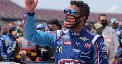 TALLADEGA, ALABAMA - JUNE 22:  Bubba Wallace, driver of the #43 Victory Junction Chevrolet, gives a thumbs up prior to the NASCAR Cup Series GEICO 500 at Talladega Superspeedway on June 22, 2020 in Talladega, Alabama. A noose was found in the garage stall of NASCAR driver Bubba Wallace at Talladega Superspeedway a week after the organization banned the Confederate flag at its facilities. (Photo by Chris Graythen/Getty Images) | Getty Images