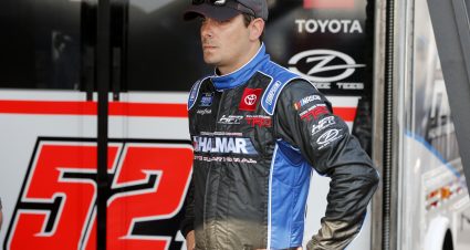 DAYTONA BEACH, FLORIDA - FEBRUARY 13: Stewart Friesen, driver of the #52 Halmar International Toyota, stands in the garage area during practice for the NASCAR Gander RV and Outdoors Truck Series NextEra Energy 250 at Daytona International Speedway on February 13, 2020 in Daytona Beach, Florida. (Photo by Brian Lawdermilk/Getty Images) | Getty Images