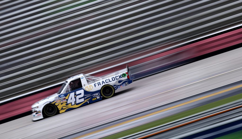 FORT WORTH, TEXAS - OCTOBER 25: James Buescher, driver of the #42 FHE Fraclock Chevrolet, drives during the NASCAR Gander RV & Outdoors Truck Series SpeedyCash.com 400 at Texas Motor Speedway on October 25, 2020 in Fort Worth, Texas. (Photo by Chris Graythen/Getty Images) | Getty Images