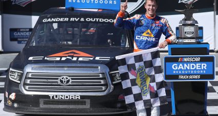 TALLADEGA, ALABAMA - OCTOBER 03: Raphael Lessard, driver of the #4 Canac Toyota, celebrates in Victory Lane after winning the NASCAR Gander RV & Outdoors Truck Series Chevy Silverado 250  at Talladega Superspeedway on October 03, 2020 in Talladega, Alabama. (Photo by Chris Graythen/Getty Images) | Getty Images