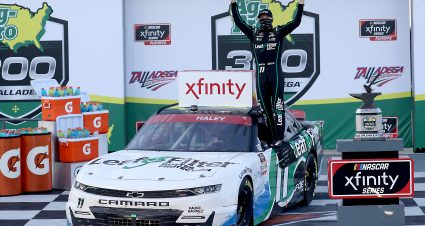 TALLADEGA, ALABAMA - OCTOBER 03: Justin Haley, driver of the #11 LeafFilter Gutter Protection Chevrolet, celebrates in victory lane after winning the NASCAR Xfinity Series Ag-Pro 300 at Talladega Superspeedway on October 03, 2020 in Talladega, Alabama. (Photo by Chris Graythen/Getty Images) | Getty Images