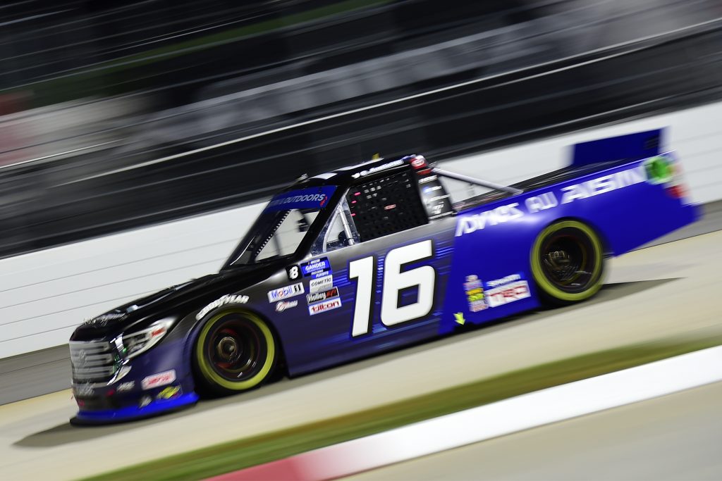 MARTINSVILLE, VIRGINIA - OCTOBER 30: Austin Hill, driver of the #16 AISIN Group Toyota, drives during the NASCAR Gander RV & Outdoors Truck Series NASCAR Hall of Fame 200 at Martinsville Speedway on October 30, 2020 in Martinsville, Virginia. (Photo by Jared C. Tilton/Getty Images) | Getty Images
