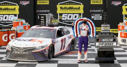 TALLADEGA, ALABAMA - OCTOBER 04: Denny Hamlin, driver of the #11 FedEx Express Toyota, celebrates in Victory Lane after winning the NASCAR Cup Series YellaWood 500 at Talladega Superspeedway on October 04, 2020 in Talladega, Alabama. (Photo by Chris Graythen/Getty Images) | Getty Images