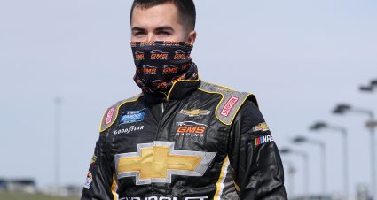 KANSAS CITY, KANSAS - OCTOBER 17: David Gravel, driver of the #24 ChevyGoods.com Chevrolet, walks the grid prior to the NASCAR Gander RV & Outdoors Truck Series Clean Harbors 200at Kansas Speedway on October 17, 2020 in Kansas City, Kansas. (Photo by Chris Graythen/Getty Images) | Getty Images