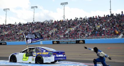 AVONDALE, ARIZONA - NOVEMBER 08: Chase Elliott, driver of the #9 NAPA Auto Parts Chevrolet, and pit crew member celebrate after winning the NASCAR Cup Series Season Finale 500 and the 2020 NASCAR Cup Series Championship at Phoenix Raceway on November 08, 2020 in Avondale, Arizona. (Photo by Jared C. Tilton/Getty Images) | Getty Images
