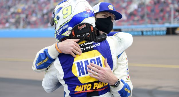 AVONDALE, ARIZONA - NOVEMBER 08: Chase Elliott, driver of the #9 NAPA Auto Parts Chevrolet, and pit crew member celebrate after winning the NASCAR Cup Series Season Finale 500 and the 2020 NASCAR Cup Series Championship at Phoenix Raceway on November 08, 2020 in Avondale, Arizona. (Photo by Jared C. Tilton/Getty Images) | Getty Images