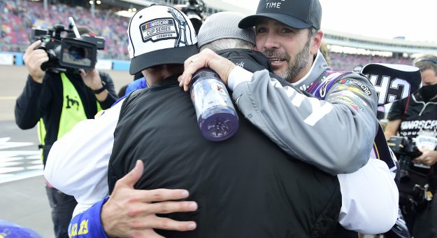AVONDALE, ARIZONA - NOVEMBER 08: Chase Elliott, driver of the #9 NAPA Auto Parts Chevrolet, is congratulated by Jimmie Johnson, driver of the #48 Ally Chevrolet, and  team owner and NASCAR Hall of Famer Rick Hendrick after winning the NASCAR Cup Series Season Finale 500 and the 2020 NASCAR Cup Series Championship at Phoenix Raceway on November 08, 2020 in Avondale, Arizona. (Photo by Jared C. Tilton/Getty Images) | Getty Images