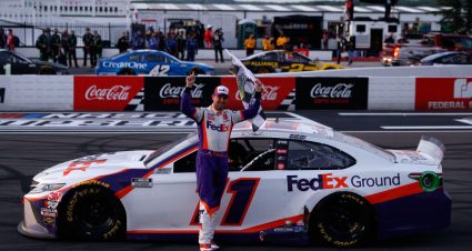 LONG POND, PENNSYLVANIA - JUNE 28: Denny Hamlin, driver of the #11 FedEx Ground Toyota, celebrates after winning the NASCAR Cup Series Pocono 350 at Pocono Raceway on June 28, 2020 in Long Pond, Pennsylvania. (Photo by Patrick Smith/Getty Images) | Getty Images