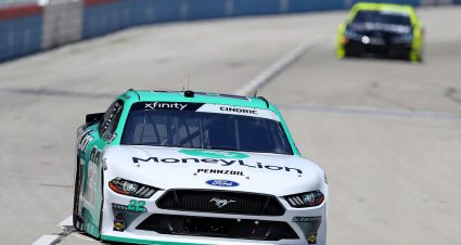 FORT WORTH, TEXAS - JULY 18: Austin Cindric, driver of the #22 MoneyLion Ford, leads Brandon Jones, driver of the #19 Menards/Bali Toyota, during the NASCAR Xfinity Series Bariatric Solutions 300 at Texas Motor Speedway on July 18, 2020 in Fort Worth, Texas. (Photo by Tom Pennington/Getty Images) | Getty Images