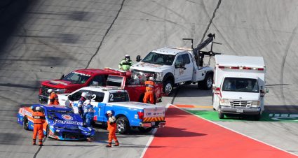 FORT WORTH, TEXAS - JULY 19: Track personnel tend to Quin Houff, driver of the #00 Permatex Chevrolet, after being involved in an on-track incident during the NASCAR Cup Series O'Reilly Auto Parts 500 at Texas Motor Speedway on July 19, 2020 in Fort Worth, Texas. (Photo by Tom Pennington/Getty Images) | Getty Images