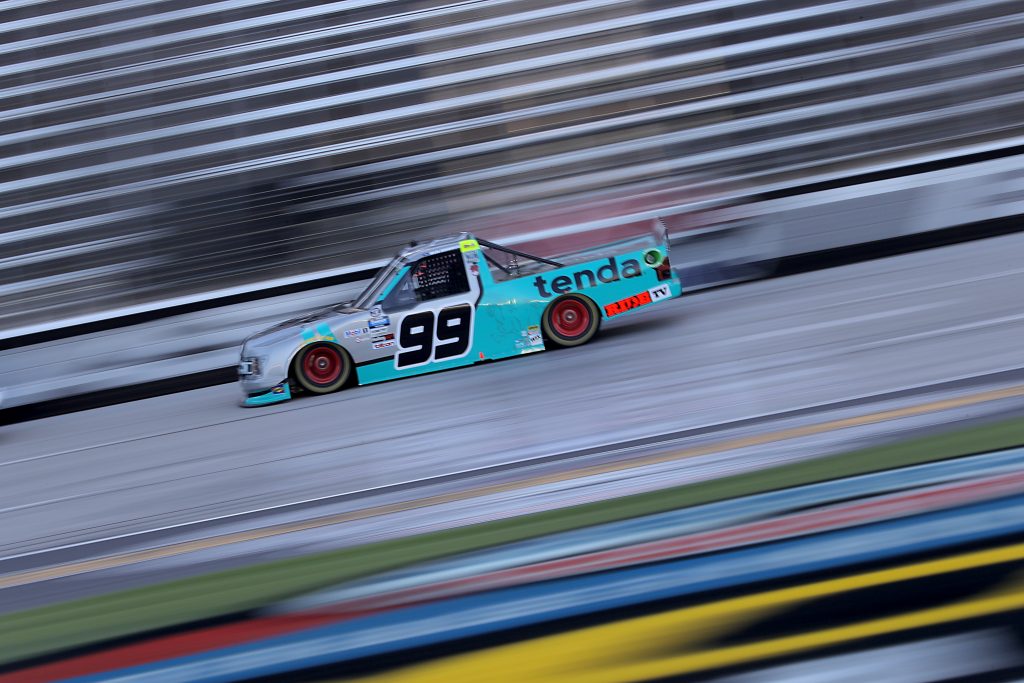 FORT WORTH, TEXAS - JULY 18: Ben Rhodes, driver of the #99 Tenda Ford, races during the NASCAR Gander RV & Outdoors Truck Series Vankor 350 at Texas Motor Speedway on July 18, 2020 in Fort Worth, Texas. (Photo by Chris Graythen/Getty Images) | Getty Images