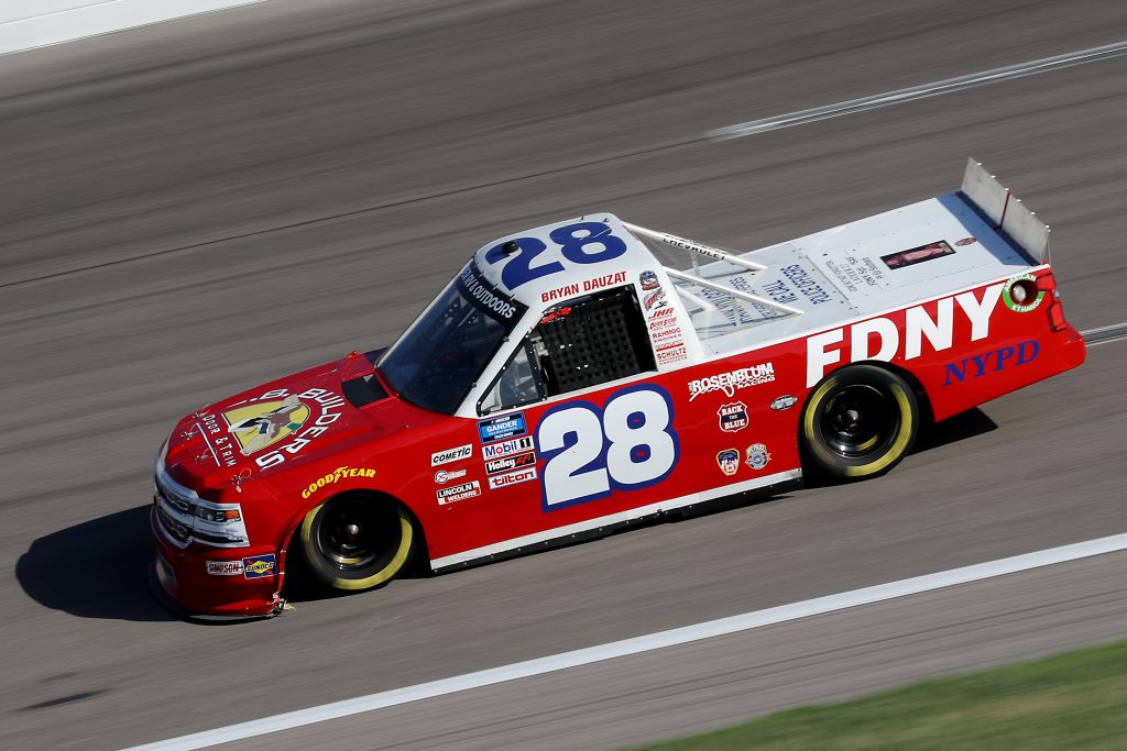 KANSAS CITY, KANSAS - JULY 24: Bryan Dauzat, driver of the #28 FDNY Racing/American Genomics Chevrolet, drives during the NASCAR Gander RV & Outdoors Truck Series Kansas 200 at Kansas Speedway on July 24, 2020 in Kansas City, Kansas. (Photo by Jamie Squire/Getty Images) | Getty Images