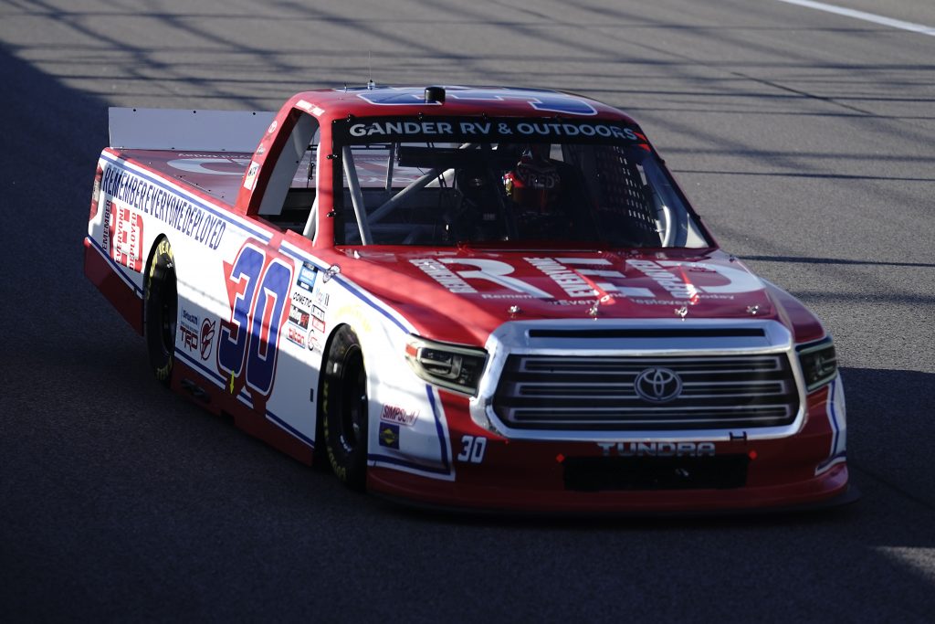 KANSAS CITY, KANSAS - JULY 24: Brennan Poole, driver of the #30 RememberEveryoneDeployed.org Toyota, drives during the NASCAR Gander RV & Outdoors Truck Series Kansas 200 at Kansas Speedway on July 24, 2020 in Kansas City, Kansas. (Photo by Kyle Rivas/Getty Images) | Getty Images