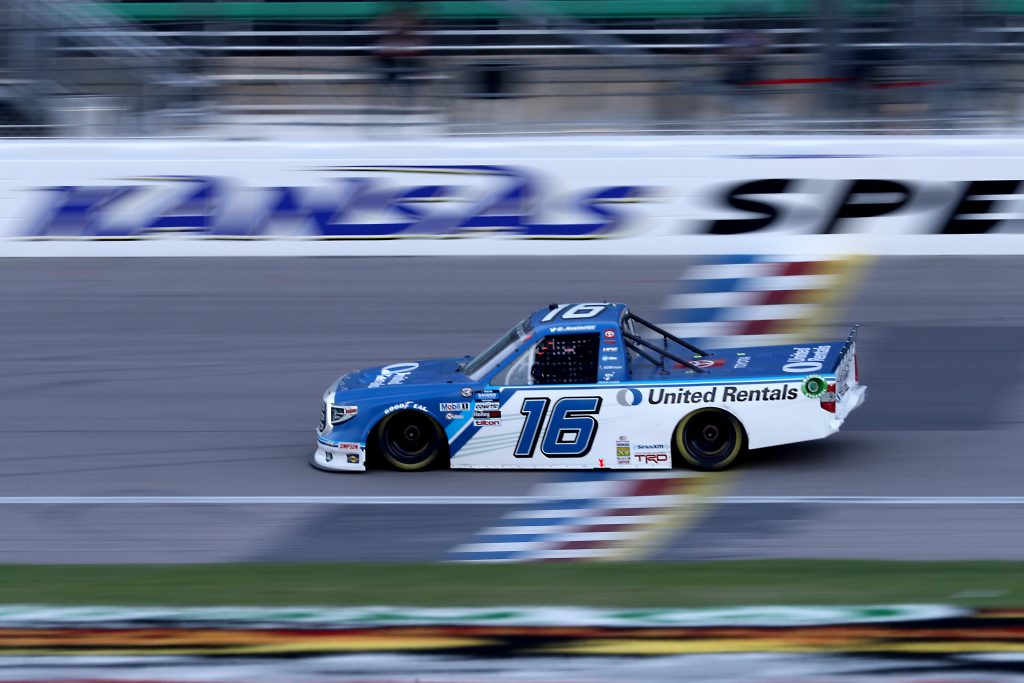 KANSAS CITY, KANSAS - JULY 24: Austin Hill, driver of the #16 United Rentals Toyota, crosses the finish line to win the NASCAR Gander RV & Outdoors Truck Series Kansas 200 at Kansas Speedway on July 24, 2020 in Kansas City, Kansas. (Photo by Jamie Squire/Getty Images) | Getty Images