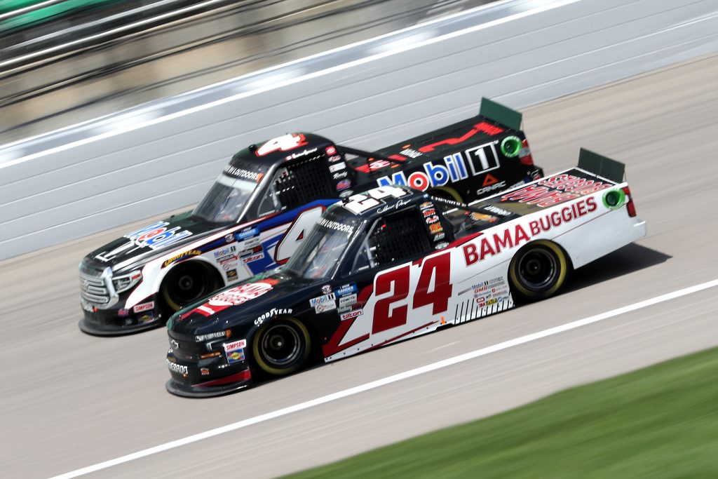 KANSAS CITY, KANSAS - JULY 25: Chase Purdy, driver of the #24 BAMABUGGIES.com Chevrolet, races Raphael Lessard, driver of the #4 Mobil 1 Toyota, during the NASCAR Gander RV & Outdoors Truck Series e.p.t 200 at Kansas Speedway on July 25, 2020 in Kansas City, Kansas. (Photo by Jamie Squire/Getty Images) | Getty Images