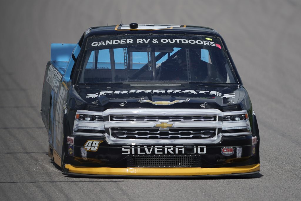 KANSAS CITY, KANSAS - JULY 25: Ray Ciccarelli, driver of the #49 CMI Motorsports Chevrolet, drives during the NASCAR Gander RV & Outdoors Truck Series e.p.t 200 at Kansas Speedway on July 25, 2020 in Kansas City, Kansas. (Photo by Kyle Rivas/Getty Images) | Getty Images