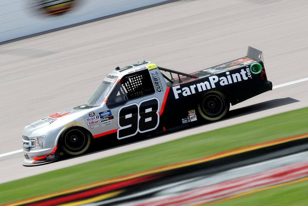 KANSAS CITY, KANSAS - JULY 25: Grant Enfinger, driver of the #98 Farm Paint Curb Records Ford, drives during the NASCAR Gander RV & Outdoors Truck Series e.p.t 200 at Kansas Speedway on July 25, 2020 in Kansas City, Kansas. (Photo by Jamie Squire/Getty Images) | Getty Images