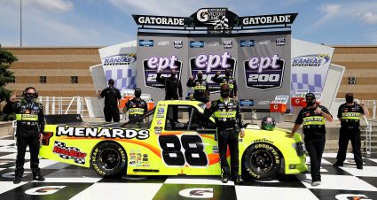 KANSAS CITY, KANSAS - JULY 25: Matt Crafton, driver of the #88 Ford, and crew celebrate in Victory Lane after winning the NASCAR Gander RV & Outdoors Truck Series e.p.t 200 at Kansas Speedway on July 25, 2020 in Kansas City, Kansas. (Photo by Jamie Squire/Getty Images) | Getty Images