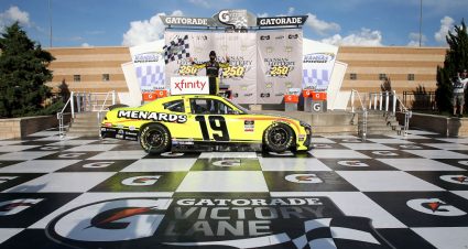 KANSAS CITY, KANSAS - JULY 25: Brandon Jones, driver of the #19 Menards/Swiffer Toyota, celebrates in Victory Lane after winning the NASCAR Xfinity Series Kansas Lottery 250 at Kansas Speedway on July 25, 2020 in Kansas City, Kansas. (Photo by Jamie Squire/Getty Images) | Getty Images
