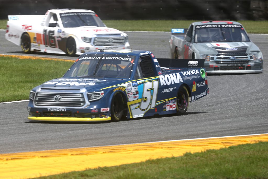 DAYTONA BEACH, FLORIDA - AUGUST 16: Alex Tagliani, driver of the #51 RONA/VIAGRA Toyota, leads the field during the NASCAR Gander RV & Outdoors Truck Series Sunoco 159 at Daytona International Speedway on August 16, 2020 in Daytona Beach, Florida. (Photo by Chris Graythen/Getty Images) | Getty Images