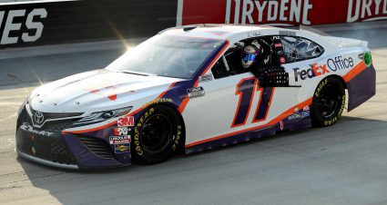 DOVER, DELAWARE - AUGUST 22: Denny Hamlin, driver of the #11 FedEx Office Toyota, celebrates after winning the NASCAR Cup Series Drydene 311 at Dover International Speedway on August 22, 2020 in Dover, Delaware. (Photo by Hunter Martin/Getty Images) | Getty Images