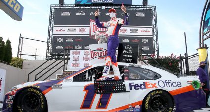 DOVER, DELAWARE - AUGUST 22: Denny Hamlin, driver of the #11 FedEx Office Toyota, celebrates in Victory Lane after winning the NASCAR Cup Series Drydene 311 at Dover International Speedway on August 22, 2020 in Dover, Delaware. (Photo by Jared C. Tilton/Getty Images) | Getty Images