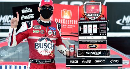 BROOKLYN, MICHIGAN - AUGUST 08: Kevin Harvick, driver of the #4 Busch Light Apple Ford, celebrates in Victory Lane after winning the NASCAR Cup Series FireKeepers Casino 400 at Michigan at Michigan International Speedway on August 08, 2020 in Brooklyn, Michigan. (Photo by Jared C. Tilton/Getty Images) | Getty Images