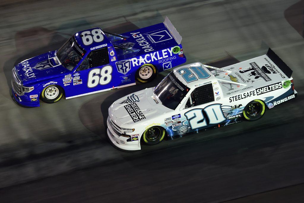 BRISTOL, TENNESSEE - SEPTEMBER 17: Spencer Boyd, driver of the #20 Steelsafe Shelters Chevrolet, and Clay Greenfield, driver of the #68 Rackley Roofing Toyota, drives during the NASCAR Gander RV & Outdoors Truck Series UNOH 200 presented by Ohio Logistics at Bristol Motor Speedway on September 17, 2020 in Bristol, Tennessee. (Photo by Jared C. Tilton/Getty Images) | Getty Images