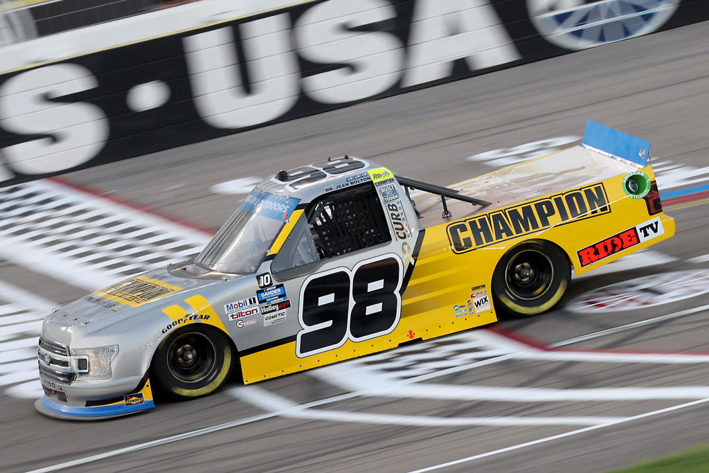 LAS VEGAS, NEVADA - SEPTEMBER 25: Grant Enfinger, driver of the #98 Champoin/Curb Records Ford, drives during the NASCAR Gander RV & Outdoors Truck Series World of Westgate 200 at Las Vegas Motor Speedway on September 25, 2020 in Las Vegas, Nevada. (Photo by Chris Graythen/Getty Images) | Getty Images