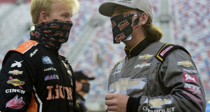 BRISTOL, TENNESSEE - SEPTEMBER 17: Tyler Ankrum, driver of the #26 LiUNA! Chevrolet, and Sheldon Creed, driver of the #2 Chevy Accessories Chevrolet, talk on the grid prior to the NASCAR Gander RV & Outdoors Truck Series UNOH 200 presented by Ohio Logistics at Bristol Motor Speedway on September 17, 2020 in Bristol, Tennessee. (Photo by Jared C. Tilton/Getty Images) | Getty Images