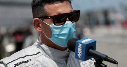 DAYTONA BEACH, FLORIDA - AUGUST 15: Andy Lally, driver of the #02 Knockaround Chevrolet, speaks to the media prior to the NASCAR Xfinity Series UNOH 188 at Daytona International Speedway on August 15, 2020 in Daytona Beach, Florida. (Photo by Chris Graythen/Getty Images) | Getty Images