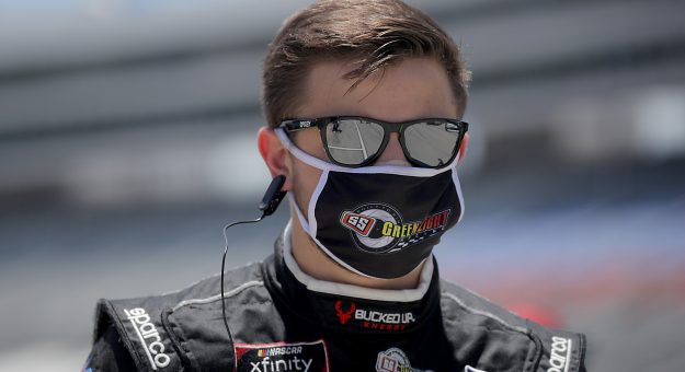 FORT WORTH, TEXAS - JULY 18: Joe Graf Jr., driver of the #08 Bucked Up Energy Chevrolet, walks on the grid prior to the NASCAR Xfinity Series Bariatric Solutions 300 at Texas Motor Speedway on July 18, 2020 in Fort Worth, Texas. (Photo by Chris Graythen/Getty Images) | Getty Images