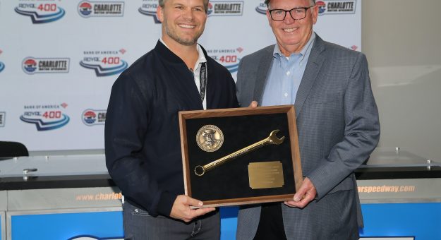 Charlotte Motor Speedway President and CEO Marcus Smith presents the Smokey Yunick mechanic award to Gary Nelson during the Bank of America Roval 400 at Charlotte Motor Speedway in Concord, NC, October 10, 2021.  (HHP/Tim Parks)