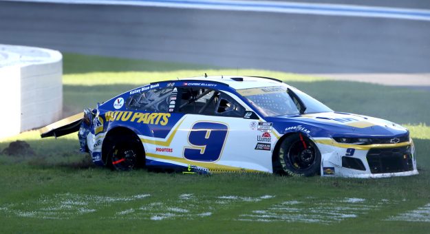 CONCORD, NORTH CAROLINA - OCTOBER 10: Chase Elliott, driver of the #9 NAPA Auto Parts Chevrolet, sits in the grass after an on-track incident during the NASCAR Cup Series Bank of America ROVAL 400 at Charlotte Motor Speedway on October 10, 2021 in Concord, North Carolina. (Photo by Brian Lawdermilk/Getty Images) | Getty Images