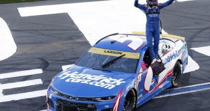 CONCORD, NORTH CAROLINA - OCTOBER 10: Kyle Larson, driver of the #5 HendrickCars.com Chevrolet, celebrates after winning the NASCAR Cup Series Bank of America ROVAL 400 at Charlotte Motor Speedway on October 10, 2021 in Concord, North Carolina. (Photo by Brian Lawdermilk/Getty Images) | Getty Images