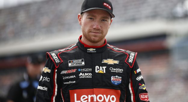 CONCORD, NORTH CAROLINA - OCTOBER 10: Tyler Reddick, driver of the #8 Lenovo Chevrolet, walks the grid prior to the NASCAR Cup Series Bank of America ROVAL 400 at Charlotte Motor Speedway on October 10, 2021 in Concord, North Carolina. (Photo by Jared C. Tilton/Getty Images) | Getty Images
