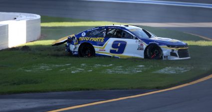 CONCORD, NORTH CAROLINA - OCTOBER 10: Chase Elliott, driver of the #9 NAPA Auto Parts Chevrolet, sits in the grass after an on-track incident during the NASCAR Cup Series Bank of America ROVAL 400 at Charlotte Motor Speedway on October 10, 2021 in Concord, North Carolina. (Photo by Brian Lawdermilk/Getty Images) | Getty Images
