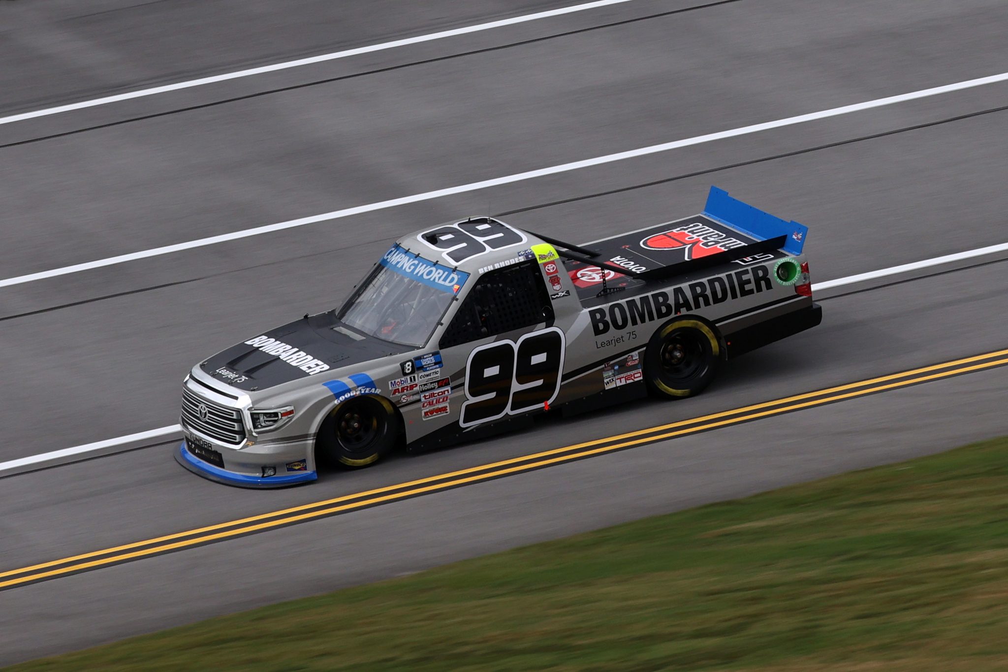 TALLADEGA, ALABAMA - OCTOBER 02: Ben Rhodes, driver of the #99 Bombardier LearJet 75 Toyota, drives during the NASCAR Camping World Truck Series Chevrolet Silverado 250 at Talladega Superspeedway on October 02, 2021 in Talladega, Alabama. (Photo by Chris Graythen/Getty Images) | Getty Images
