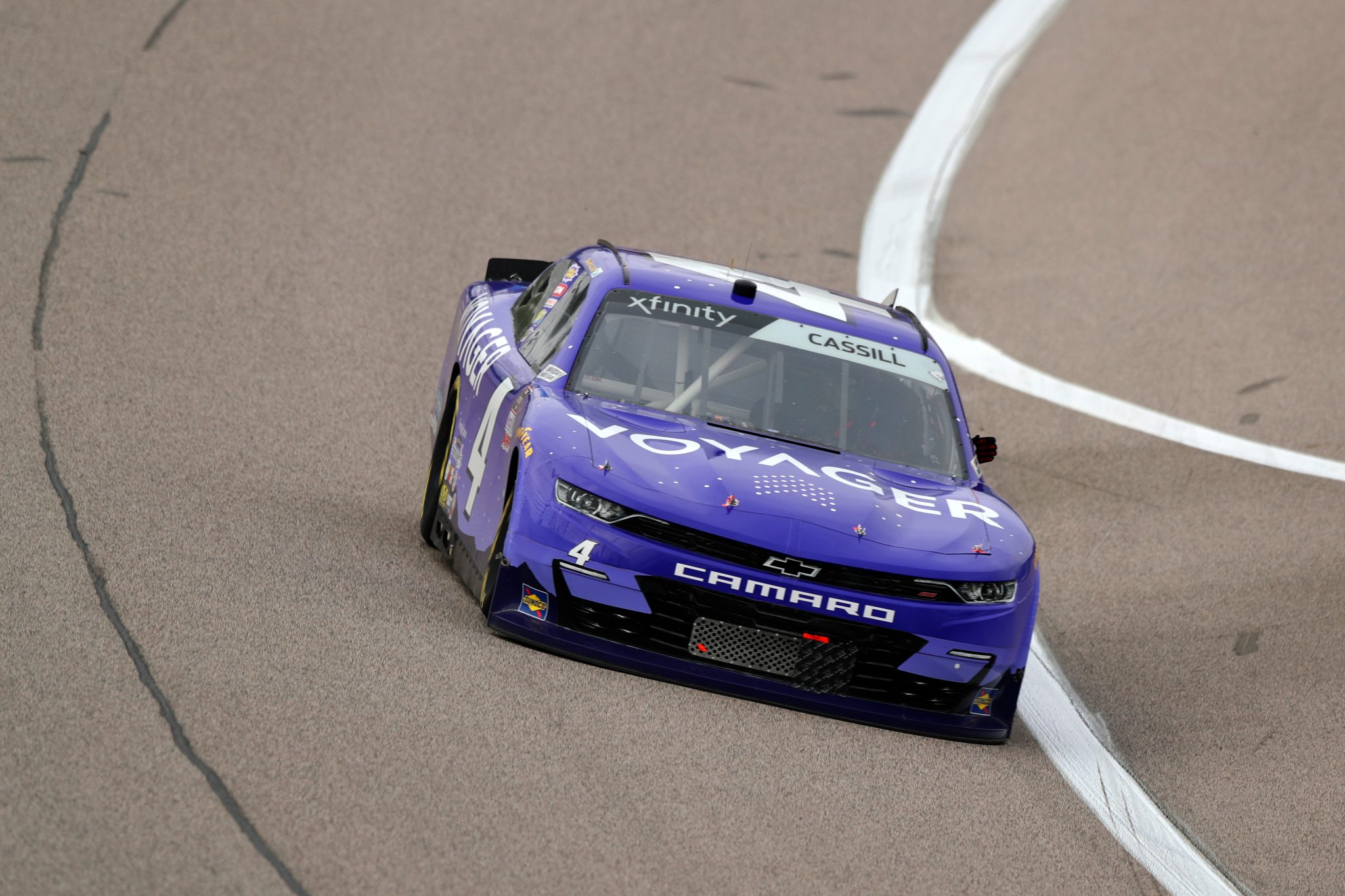 KANSAS CITY, KANSAS - OCTOBER 23: Landon Cassill, driver of the #4 Voyager Chevrolet, drives during the NASCAR Xfinity Series Kansas Lottery 300 at Kansas Speedway on October 23, 2021 in Kansas City, Kansas. (Photo by Meg Oliphant/Getty Images) | Getty Images
