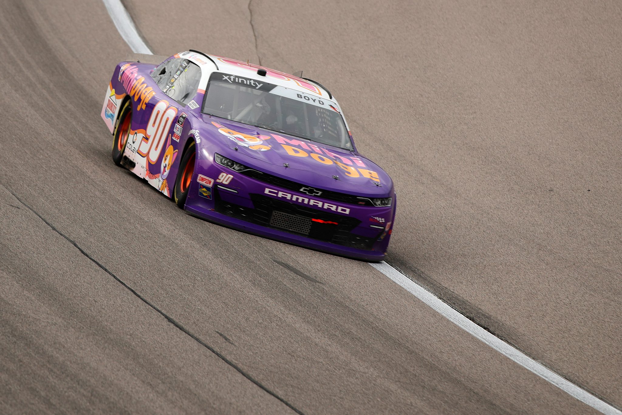 KANSAS CITY, KANSAS - OCTOBER 23: Spencer Boyd, driver of the #90 MiniDoge Chevrolet, drives during the NASCAR Xfinity Series Kansas Lottery 300 at Kansas Speedway on October 23, 2021 in Kansas City, Kansas. (Photo by Meg Oliphant/Getty Images) | Getty Images