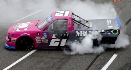 MARTINSVILLE, VIRGINIA - OCTOBER 30: Zane Smith, driver of the #21 MRC Construction Chevrolet, celebrates with a burnout after winning the NASCAR Camping World Truck Series United Rentals 200 at Martinsville Speedway on October 30, 2021 in Martinsville, Virginia. (Photo by Brian Lawdermilk/Getty Images) | Getty Images