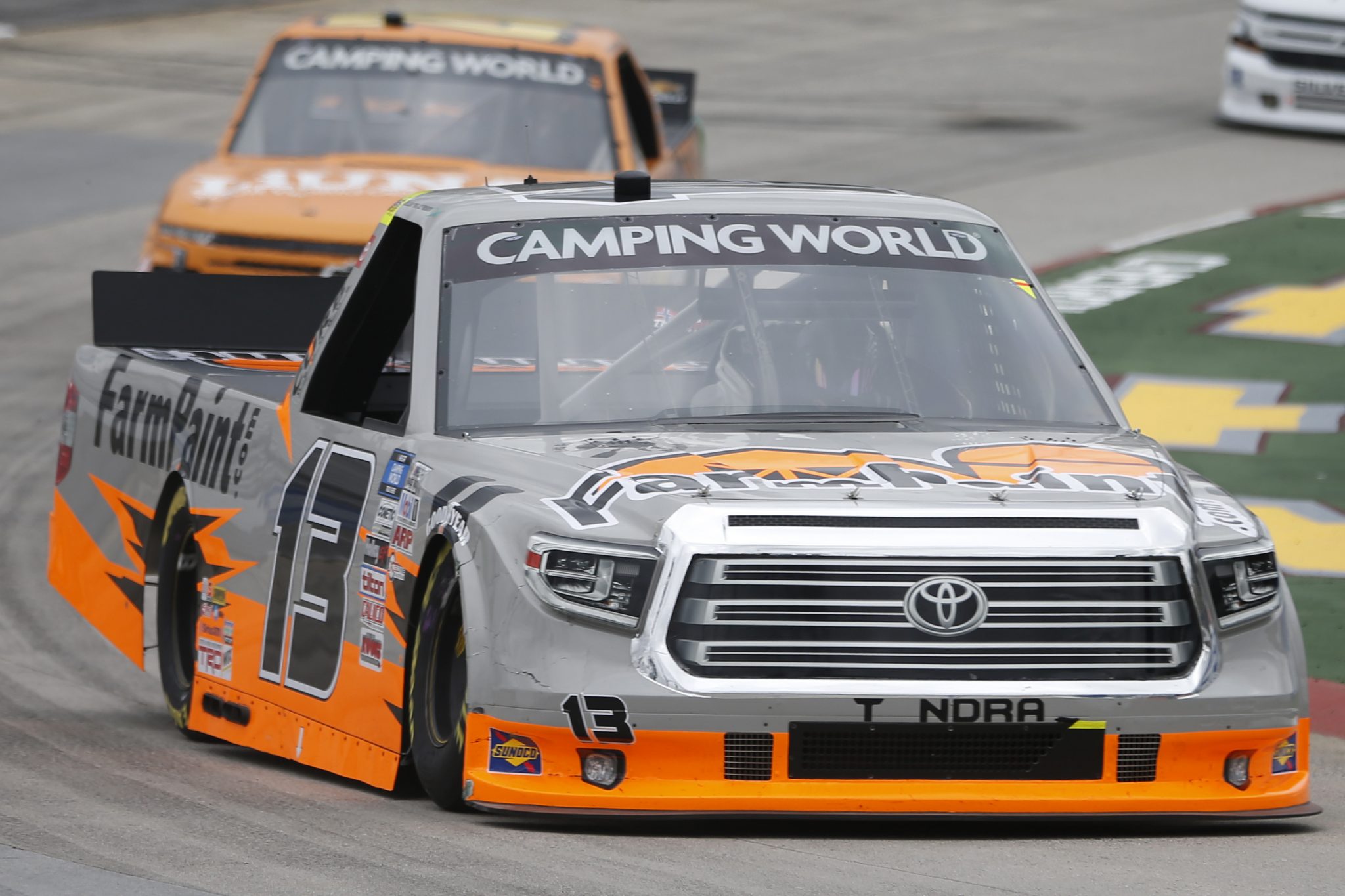 MARTINSVILLE, VIRGINIA - OCTOBER 30: Johnny Sauter, driver of the #13 Farm Paint Toyota, drives during the NASCAR Camping World Truck Series United Rentals 200 at Martinsville Speedway on October 30, 2021 in Martinsville, Virginia. (Photo by Brian Lawdermilk/Getty Images) | Getty Images