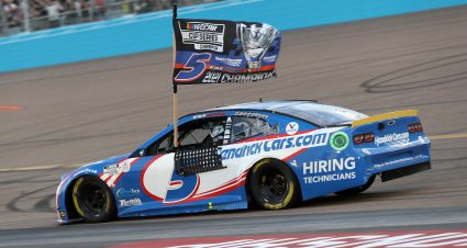 AVONDALE, ARIZONA - NOVEMBER 07: Kyle Larson, driver of the #5 HendrickCars.com Chevrolet, celebrates with the 2021 NASCAR Cup Series Championship flag after winning the NASCAR Cup Series Championship at Phoenix Raceway on November 07, 2021 in Avondale, Arizona. (Photo by Meg Oliphant/Getty Images) | Getty Images