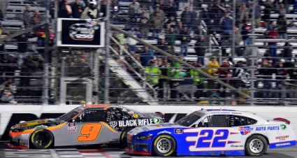 MARTINSVILLE, VIRGINIA - OCTOBER 30: Noah Gragson, driver of the #9 Bass Pro Shops/TrueTimber/BRCC Chevrolet, takes the checkered flag ahead of Austin Cindric, driver of the #22 Carquest Auto Parts Ford, to win the NASCAR Xfinity Series Dead on Tools 250 at Martinsville Speedway on October 30, 2021 in Martinsville, Virginia. (Photo by Logan Riely/Getty Images) | Getty Images