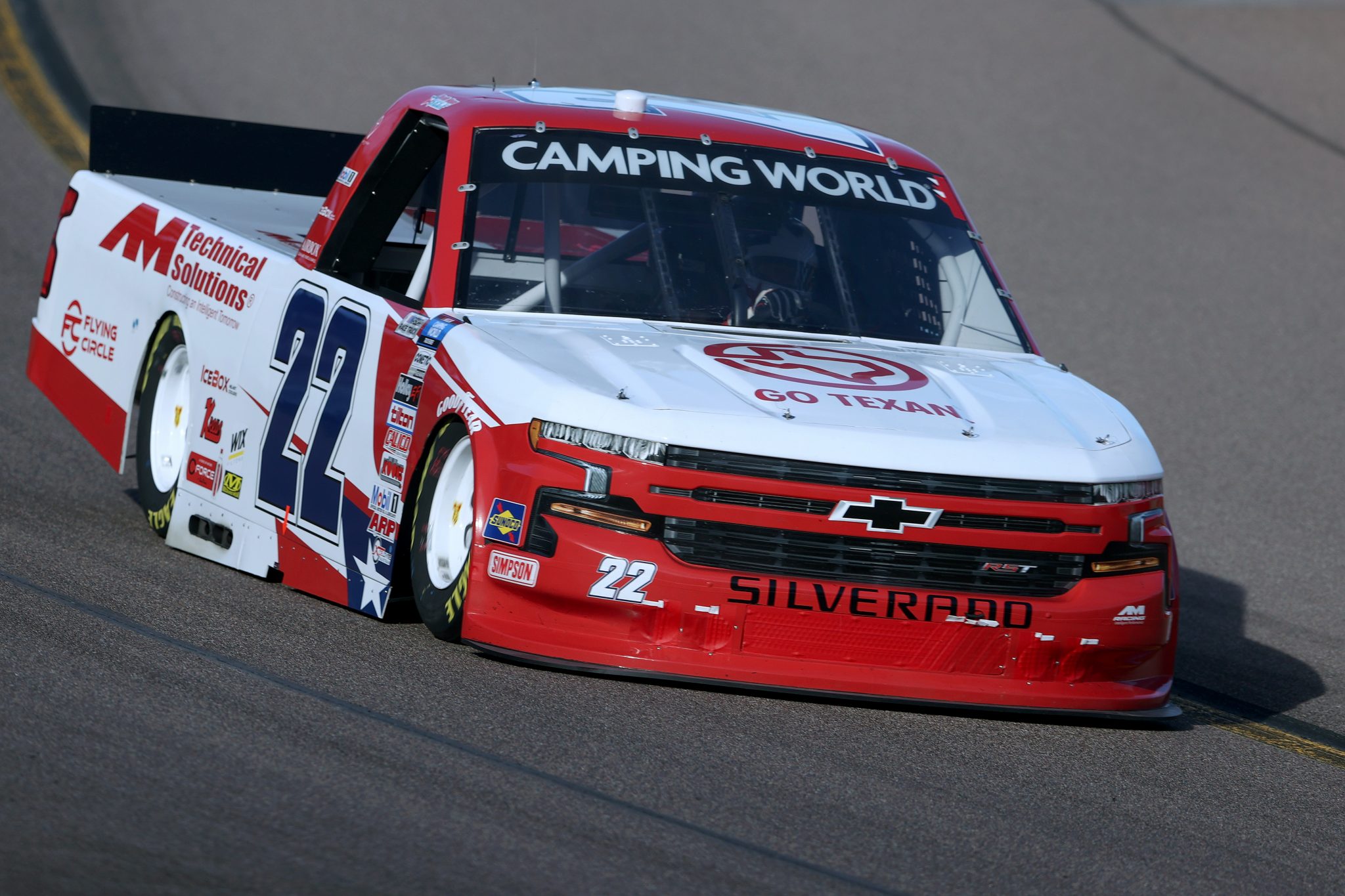 AVONDALE, ARIZONA - NOVEMBER 05: Austin Wayne Self, driver of the #22 GOTEXAN/AM Technical Solutions Chevrolet, drives during qualifying for the NASCAR Camping World Truck Series Lucas Oil 150 at Phoenix Raceway on November 05, 2021 in Avondale, Arizona. (Photo by Christian Petersen/Getty Images) | Getty Images