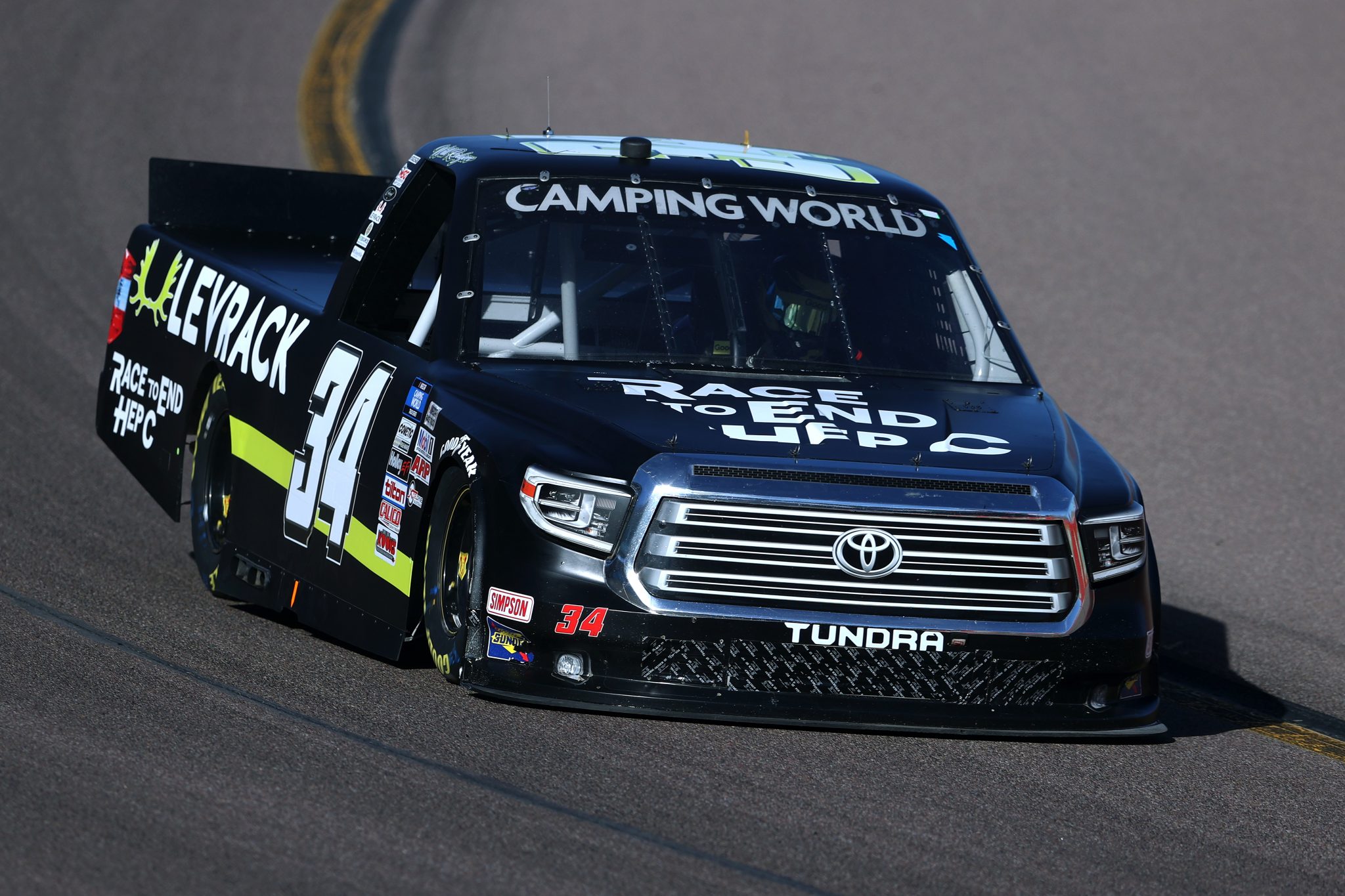 AVONDALE, ARIZONA - NOVEMBER 05: Will Rodgers, driver of the #34 Race To End Hep C Toyota, drives during qualifying for the NASCAR Camping World Truck Series Lucas Oil 150 at Phoenix Raceway on November 05, 2021 in Avondale, Arizona. (Photo by Christian Petersen/Getty Images) | Getty Images