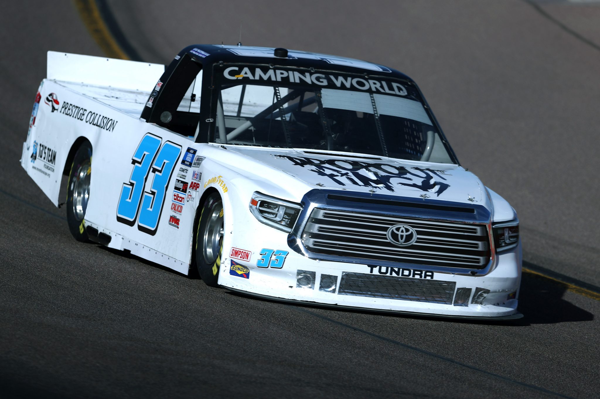 AVONDALE, ARIZONA - NOVEMBER 05: Chris Hacker, driver of the #33 Dropout Kings Toyota, drives during qualifying for the NASCAR Camping World Truck Series Lucas Oil 150 at Phoenix Raceway on November 05, 2021 in Avondale, Arizona. (Photo by Christian Petersen/Getty Images) | Getty Images